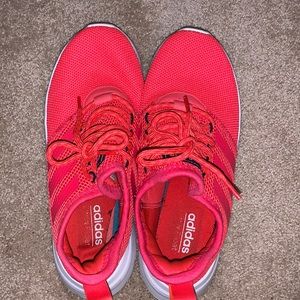 Neon pink Adidas sneakers